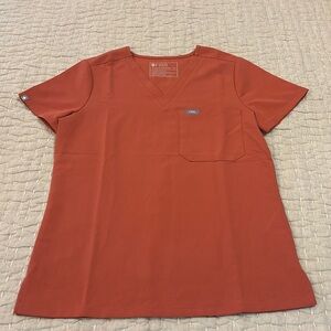 Figs XS Catarina one pocket scrub top. Terracotta color.
